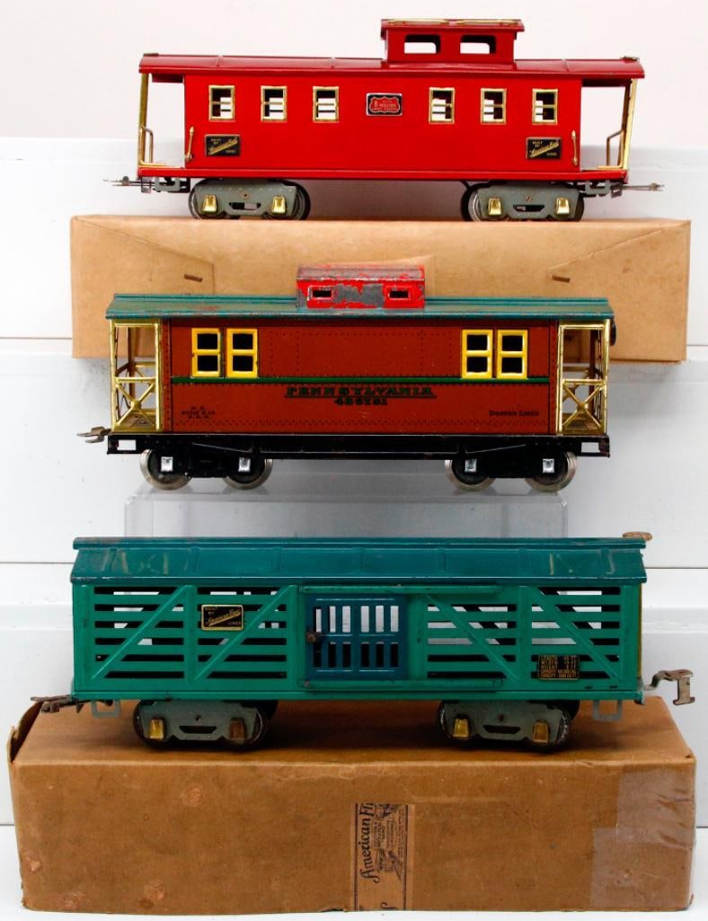 American Flyer Prewar Wide Gauge 4020 Livestock Car & 4021 Caboose/Dorfan Prewar Wide Gauge Caboose: American Flyer Prewar Wide Gauge 4020 Livestock Car and 4021 red Caboose/Dorfan Prewar Wide Gauge Caboose, with the 4020 in C6 minus and with a partial original box, and the 4021 red Caboose in C6 but