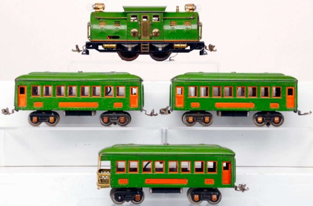 Lionel Prewar O Gauge 254 pea green and orange Electric Loco with 610 -610-612 pea green Cars: Lionel Prewar O Gauge 254 pea green and orange Electric Loco with 610 - 610 - 612 pea green Passenger Cars with unusual orange vent inserts, in C6 plus to C7 minus overall condition. Missing whistle o