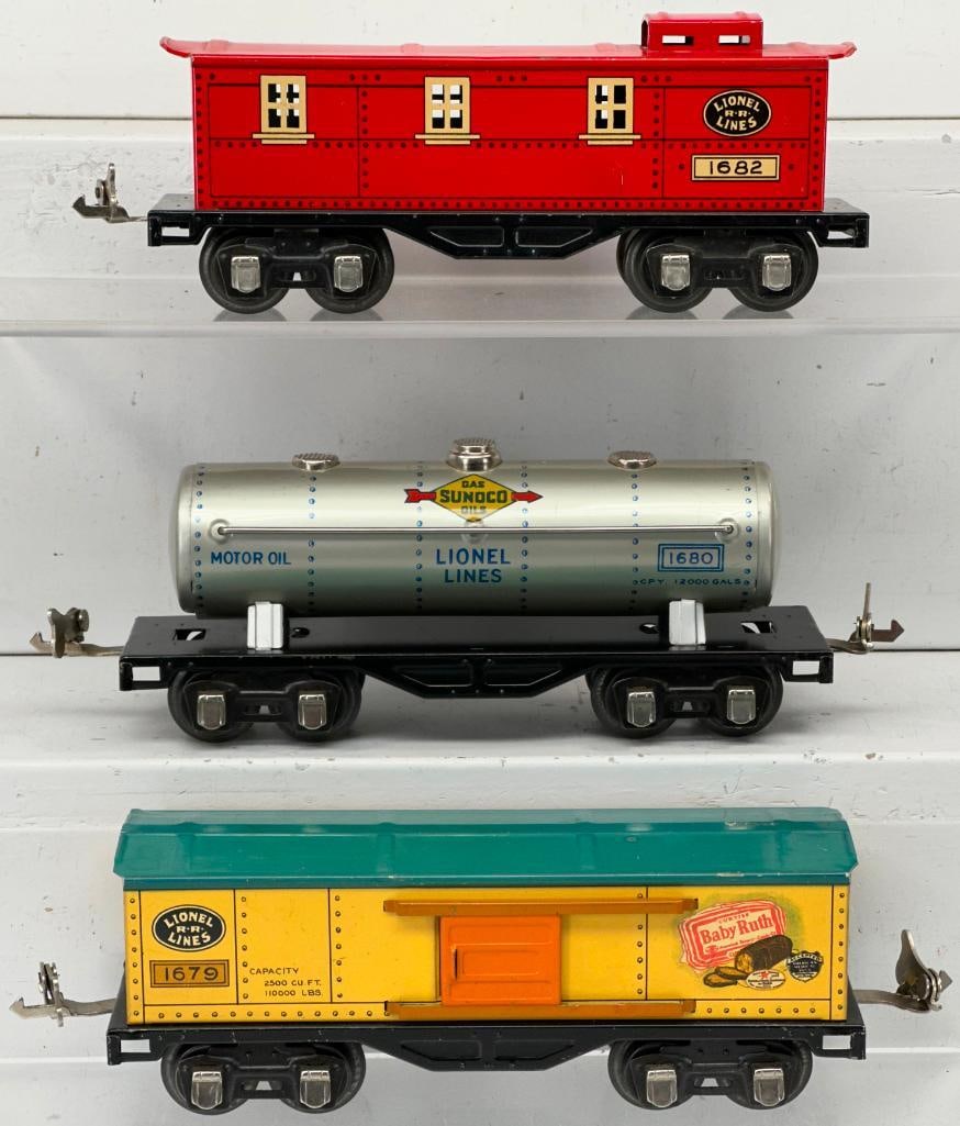 Lionel Prewar O Gauge 1679 yellow Litho /peacock roof Box Car – 1680 Sunoco Tank Car –: Lionel Prewar O Gauge 1679 yellow Litho /peacock roof Box Car – 1680 Sunoco Tank Car – 1682 red Caboose, with the 1682 and 1680 in C7, and the 1679 in C6 plus or better.