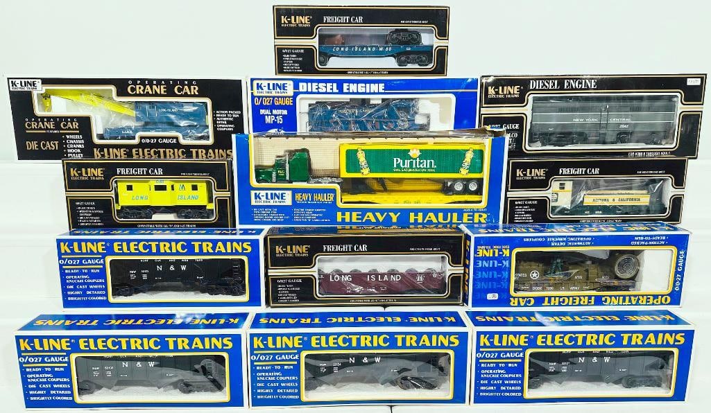 K-Line Modern O Gauge Thirteen (13) Assorted Freight Cars Boxed: K-Line Modern O Gauge Thirteen (13) Assorted Freight Cars Boxed, including Long Island Railroad Crane Car, Procter & Gamble Dual Motor MP - 15, New York Central Dummy Alco B Unit, Puritan Heavy Hauler