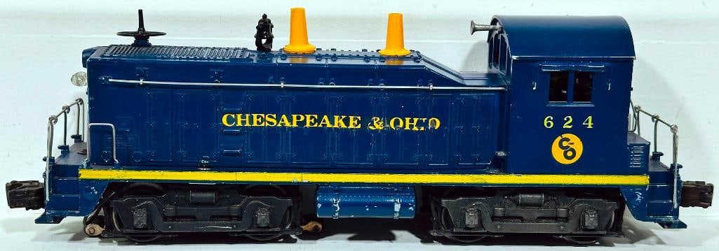 Lionel Postwar O Gauge 624 Chesapeake and Ohio Switcher: Lionel Postwar O Gauge 624 Chesapeake and Ohio Switcher, in C7. This is the 3 stanchion variation, not the regular 10 stanchion version.
