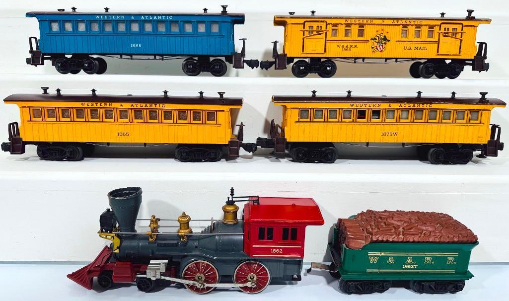 Lionel Postwar O Gauge 1862 gray and red Loco and 1862T Tender with 1885 blue/1866/1865/1875W: Lionel Postwar O Gauge 1862 gray and red Loco and 1862T Tender with 1885 blue/1866/1865/1875W, in C7 for the Loco and Tender and C6 plus to C7 minus overall for the four old-time Passenger Cars.