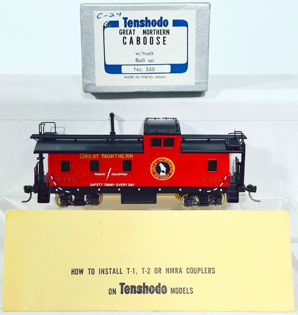 Tenshodo Brass HO Scale Great Northern Caboose with trucks: Tenshodo Brass HO Scale Great Northern Caboose with trucks, in C8 or better and with its original box.