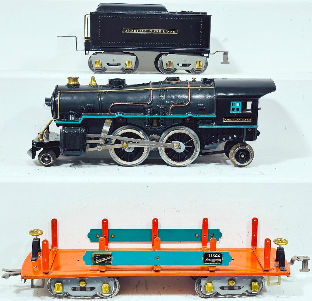 American Flyer Prewar Wide Gauge 4670 black Locomotive and 4671 black Tender and 4022 Machinery Car: American Flyer Prewar Wide Gauge 4670 black Locomotive and 4671 black Tender and 4022 orange and peacock green Machinery Car, with the Loco and Tender repainted to look C7 and the 4022 in C7.