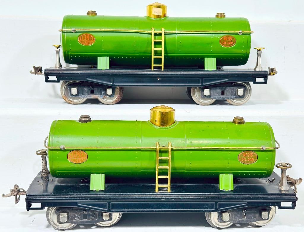 Lionel Prewar Standard Gauge 215 pea green Tank Car X2: Lionel Prewar Standard Gauge 215 pea green Tank Car X2, a 215 in C7 and the other 215 in C7 minus with some rust on the wheels.