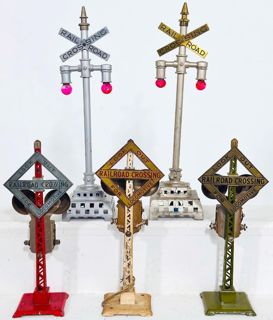 Lionel Prewar 69 Warning Bell X3 and 79 Flashing Highway Signal X2: Lionel Prewar 69 Warning Bell X3 and 79 Flashing Highway Signal X2, with a 79 Flashing Highway Signal repainted to look C7 and the other 79 Flashing Highway Signal in C5 because of cracked base; also 
