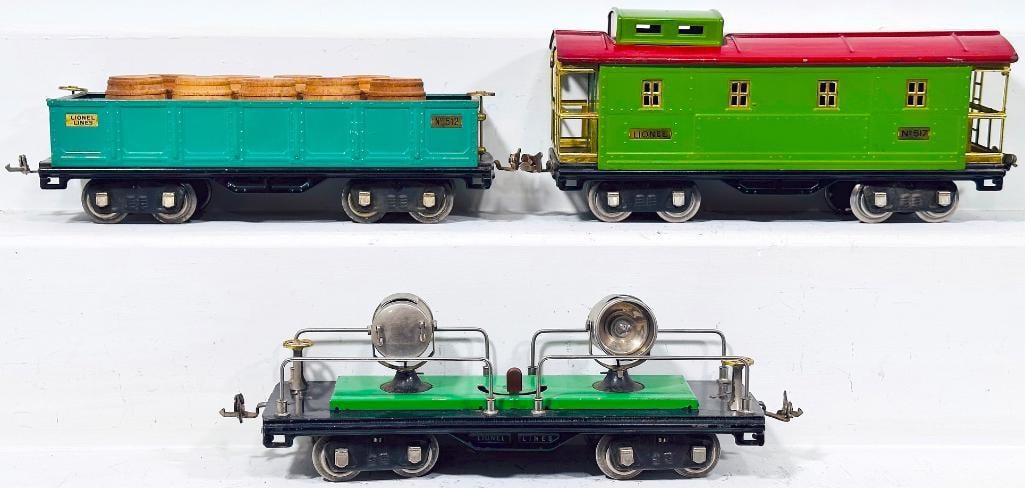 Lionel Prewar Standard Gauge 520 Green Floodlight Car-512 peacock Gondola with 9 barrels-517 Caboose: Lionel Prewar Standard Gauge 520 Green Floodlight Car - 512 peacock Gondola with 9 barrels - 517 green and red Caboose, with the 517 in C7 minus, the 512 in C7 and the 520 in C6 to C6 plus.
