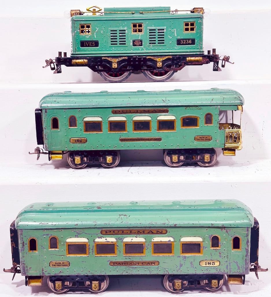 Ives Prewar Wide Gauge 3236 Cadet Blue Electric Locomotive /185-186 brass plated Passenger Cars: Ives Prewar Wide Gauge 3236 Cadet Blue Electric Locomotive and 185 - 186 brass plated Cadet Blue Passenger Cars, in C6 minus overall condition.