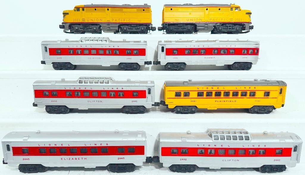 Lionel Postwar O Gauge 2023 Union Pacific A-A Yellow/Gray Alco Units and 5 Assorted Passenger Cars: Lionel Postwar O Gauge 2023 Union Pacific A - A Yellow/Gray Alco Units and Five (5) Assorted Passenger Cars, with the 2023 A - A in C7 minus overall, and also includes 2442 in C7, 2481 in C7, 2445 in