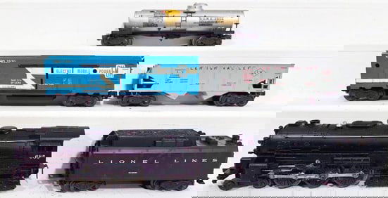 Lionel Postwar O Gauge 685 Black Locomotive and 6026W Black Tender and Three Assorted Freight Cars