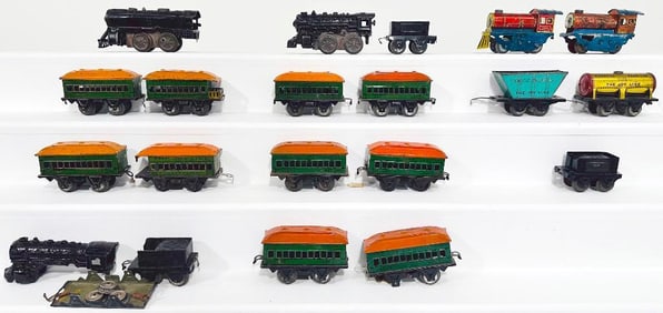 Joy Line Prewar O Gauge Clockwork Locomotive and Tender and Four (4) Passenger Cars/Clockwork Loco