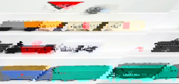 Marx Postwar O Gauge Two (2) Assorted green F Diesel Unit Shells and Eight (8) Freight Cars