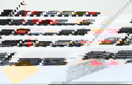 Marx Prewar and Postwar O Gauge Twenty Assorted Freight Cars and Canadian Pacific Loco and Tender