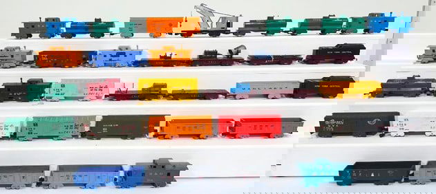 Marx Postwar O Gauge Twenty-Nine (29) Assorted Plastic 4 wheel Freight Cars and Two (2) Tenders