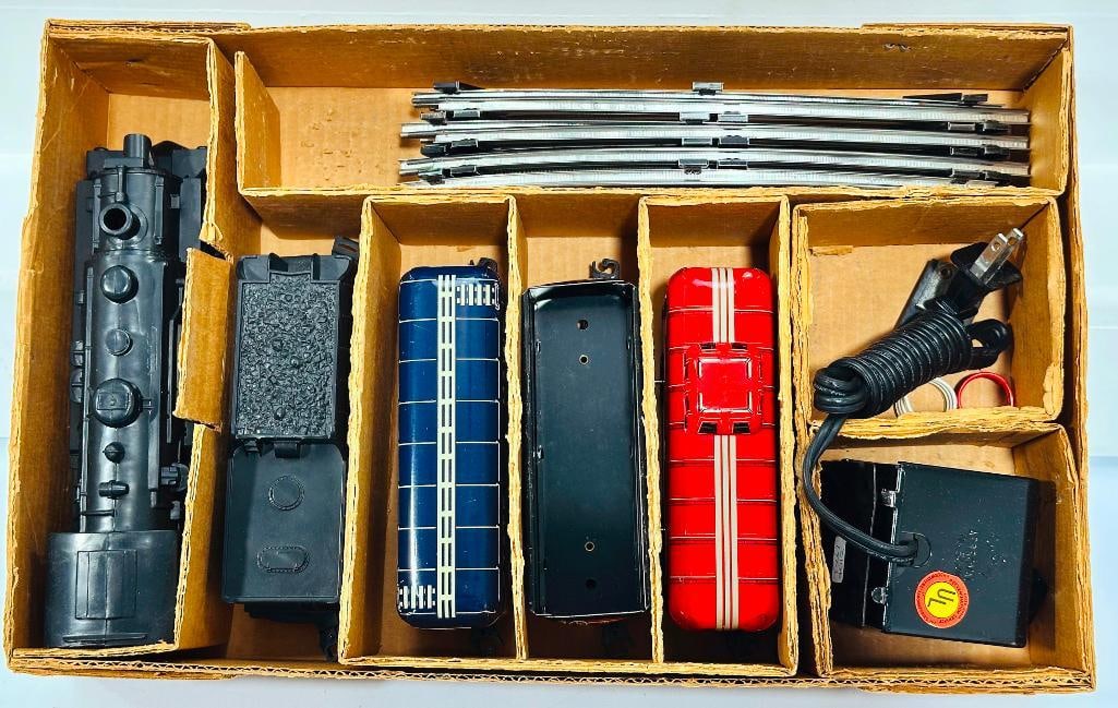 Marx Postwar O Gauge Outfit No. 4012 400 Locomotive Freight Set Boxed: Marx Postwar O Gauge Outfit No. 4012 400 Locomotive Freight Set Boxed, including 400 0 – 4 – 0 Locomotive, 1951 NYC Tender, 4500 BAR Box Car, 91257 Seaboard Gondola and 20102 NYC Caboose,