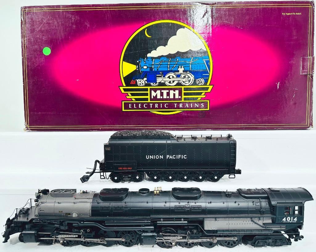 MTH Modern O Gauge Union Pacific 4 – 8 – 8 – 4 Big Boy Locomotive and Tender with PS – 2: MTH Modern O Gauge Union Pacific 4 – 8 – 8 – 4 Big Boy Locomotive and Tender with PS – 2 Boxed, in C8 plus and with its original box that shows light wear.