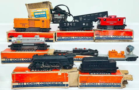 Lionel Postwar O Gauge 1666 Freight Set: Lionel Postwar O Gauge 1666 Freight Set, including a 1666 black Locomotive and 2466WX Tender, each in C7 minus or better; this Lot also includes a 2454 Pennsylvania Box Car, a 2465 Double Dome Tank Ca