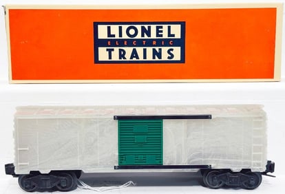 Lionel Postwar O Gauge 6464 1950s Door Style Box Car Type II with green doors and translucent body