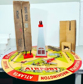 Lionel Prewar 50 Remote-Control Airplane with 49 circular Cardboard Landing Field Boxed