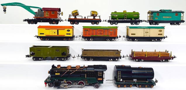 Lionel Prewar O Gauge 260E green frame and black Locomotive/ 265 Tender/ Ten Assorted Freight Cars: Lionel Prewar O Gauge 260E green frame and black Locomotive and 265 Tender with Ten (10) Assorted Freight Cars, with the 260E Loco in C6 plus and missing one whistle next to the steam stack, the 265 T