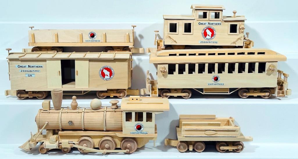 Unknown Manufacturer Modern G Scale all - wood 4 - 6 - 0 Locomotive and Tender/Three (3) Freight Car: Unknown Manufacturer Modern G Scale all - wood 4 - 6 - 0 Locomotive and Tender/Three (3) Freight Cars/Passenger Car, each in C7 or better. This is a very unique unpainted wood toy train set.