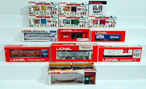 Lionel Modern O Gauge Twelve (12) Assorted Freight Cars Boxed: Lionel Modern O Gauge Twelve (12) Assorted Freight Cars Boxed, including Pluto Car, Mickey Mouse 50th Anniversary Car, New Haven Hi - Cube Box Car, Miller Reefer Car, Amtrak Alco B Nonpowered Dummy Un