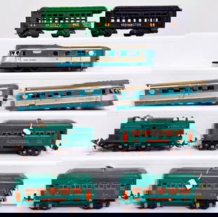 Lionel Prewar O Gauge 252 Peacock Electric Locomotive and 608 - 607 - 607 Peacock Passenger Cars: Lionel Prewar O Gauge 252 Peacock Electric Locomotive and 608 - 607 - 607 Peacock Passenger Cars and American Flyer Prewar O Gauge The Comet 3 Car Passenger Set, each in C6 overall condition. This Lot