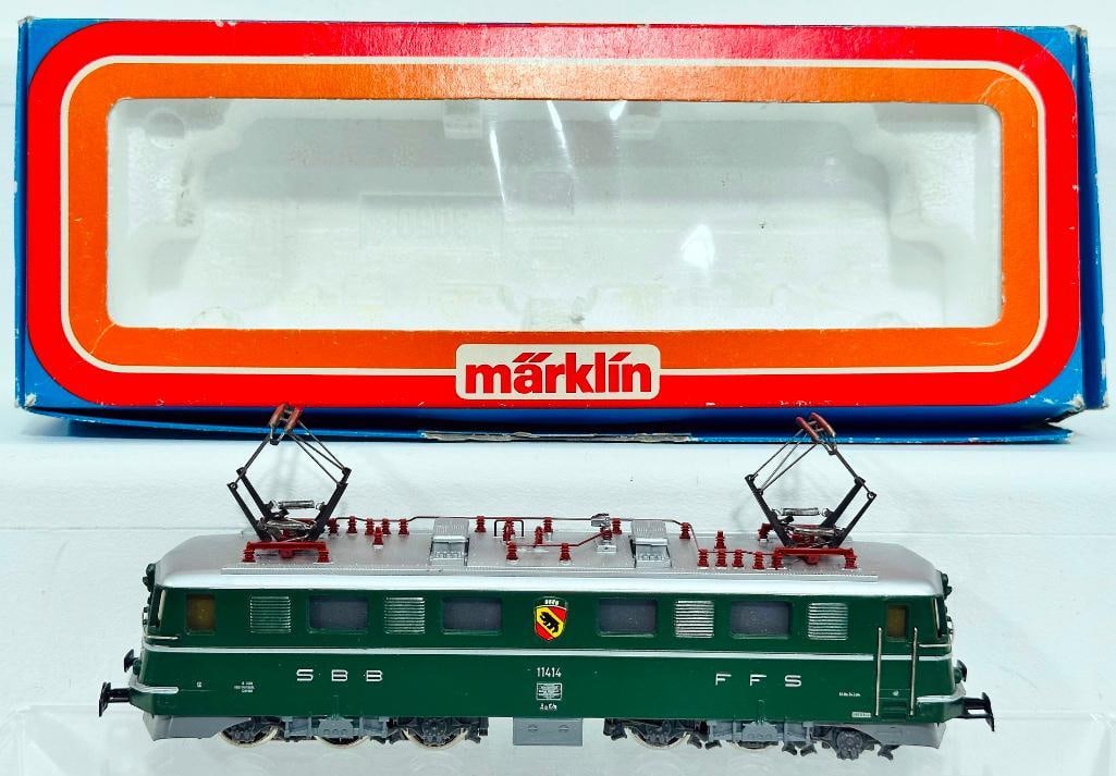 Marklin Modern HO Scale Electric Locomotive #3049: Marklin Modern HO Scale Electric Locomotive #3049, in C8 or better and with its original box that shows torn corners and light wear.