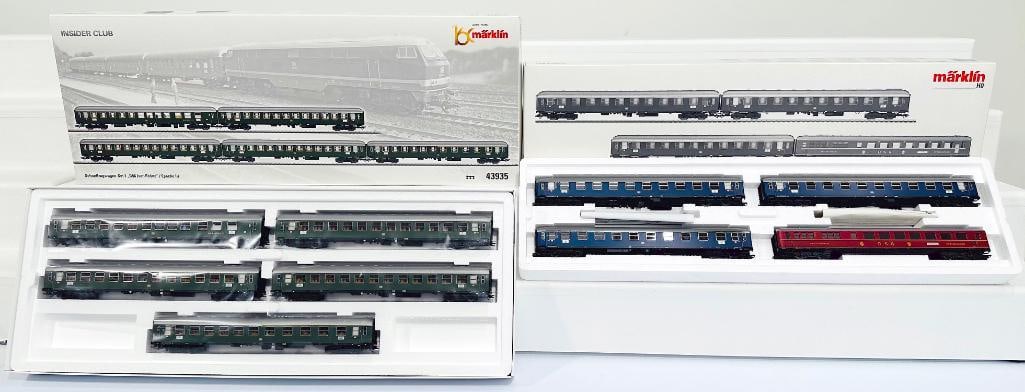 Marklin Modern HO Scale Express Train Passenger Car Set #43935 and Express Train Passenger Car Set: Marklin Modern HO Scale Express Train Passenger Car Set #43935 and Express Train Passenger Car Set #43929, each in C9 and each with its original box.