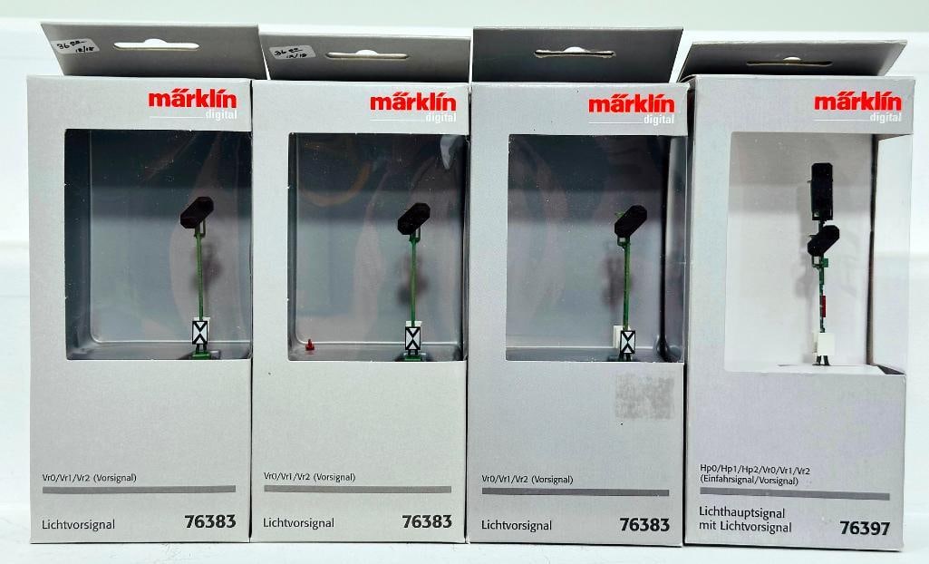 Marklin Modern Digital HO Color Light Home Signal with Color Light Distance Signal #76397: Marklin Modern Digital HO Color Light Home Signal with Color Light Distance Signal #76397 -Color Light Distance Signal #76383 X3, each in C9 and each with its original box.