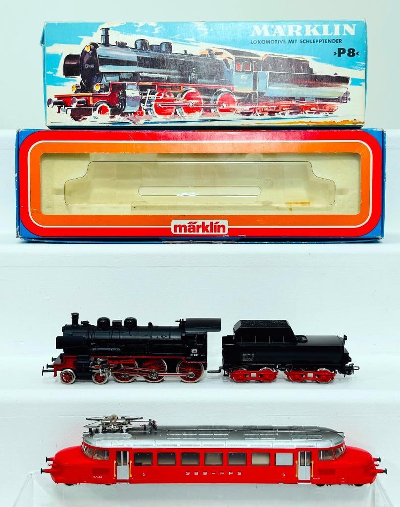 Marklin Modern HO Scale Electric Locomotive SPB -FFS #3125 and Locomotive and Tender #3098: Marklin Modern HO Scale Electric Locomotive SPB -FFS #3125, in C9 and with its original box that shows light wear, and Locomotive and Tender #3098, in C8 and with its original box.