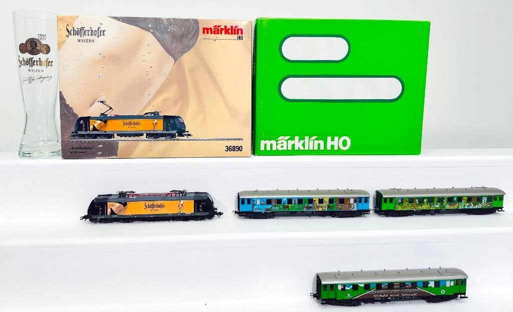 Marklin Modern HO Scale Electric Locomotive BR 185 #36890 and Marklin Modern HO Scale Passenger Car: Marklin Modern HO Scale Electric Locomotive BR 185 #36890 and Marklin Modern HO Scale Passenger Car Set #4190, each in C9 and each with its original box.
