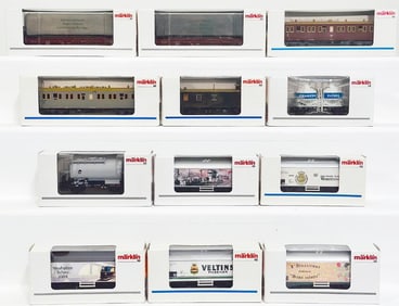 Marklin Modern HO Scale Ten (10) Assorted Freight Cars and Two (2) Passenger Cars