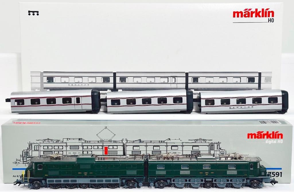 Marklin Modern HO Scale 150 Years of Swiss Railroading #37591/Add-On Car Set for the Class VT 10.1: Marklin Modern HO Scale 150 Years of Swiss Railroading #37591 and Add-On Car Set for the Class VT 10.1 Senator Daytime Articulated Train #4110, each in C9 and each with its original box.