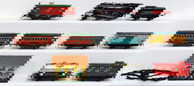 Lionel Prewar O Gauge black and red Lionel Junior Locomotive/ black and red Tender/ Four (4) Cars