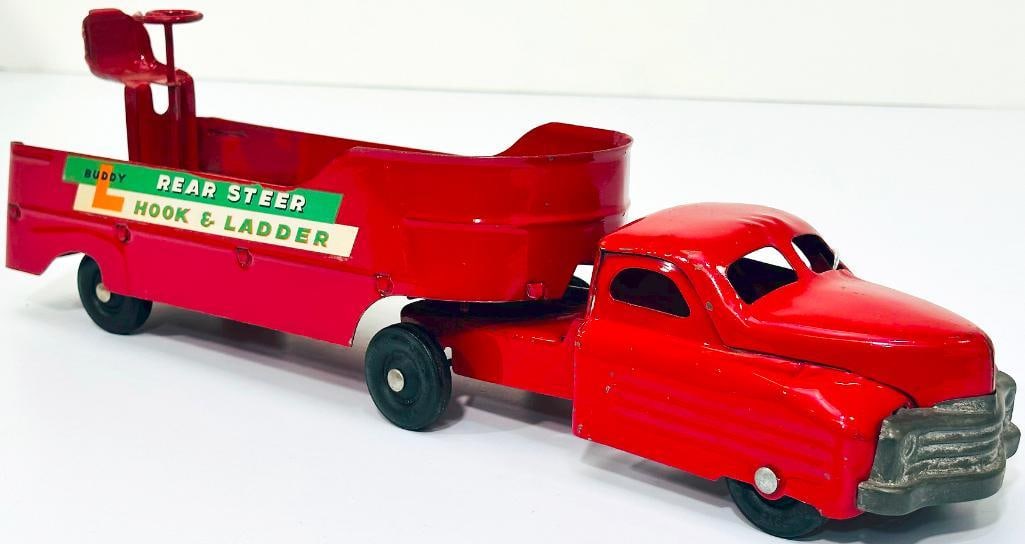 Buddy L Postwar #411 Rear Steer Hook and Ladder red: Buddy L Postwar #411 Rear Steer Hook and Ladder red, in C7 and made in 1952. Missing the ladders.
