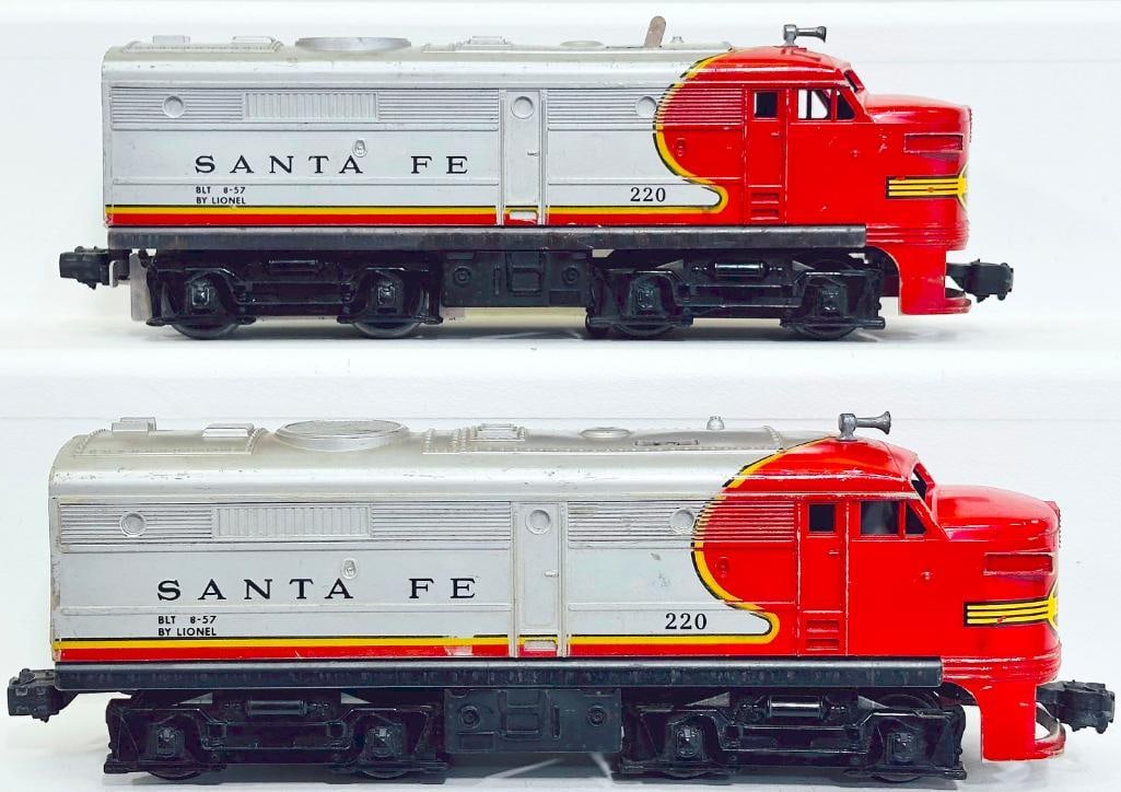 Lionel Postwar O Gauge Alco ATSF 220 A - A Diesel Units from 1960: Lionel Postwar O Gauge Alco ATSF 220 A - A Diesel Units from 1960, each in C6, given decal wear in front and broken front cowl on dummy unit.