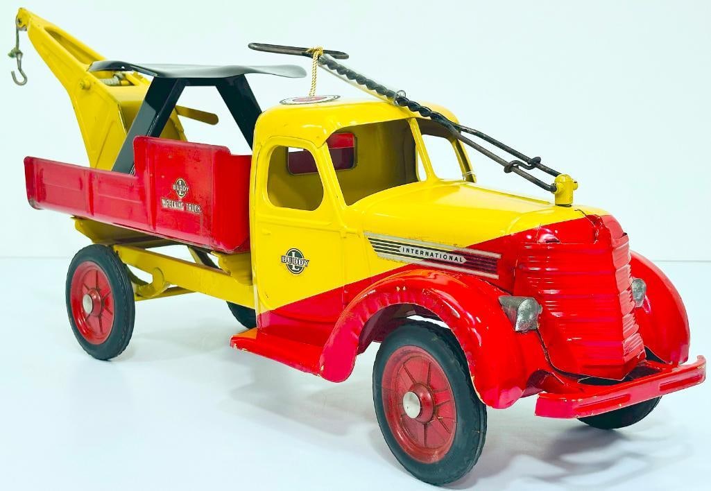 Buddy L Postwar 903 Deluxe Rider Wrecking Truck yellow and red manufactured 1948: Buddy L Postwar 903 Deluxe Rider Wrecking Truck yellow and red manufactured 1948, in C7 plus or better. The provenance for this piece is the Bertoia Donald Kaufman Auction.