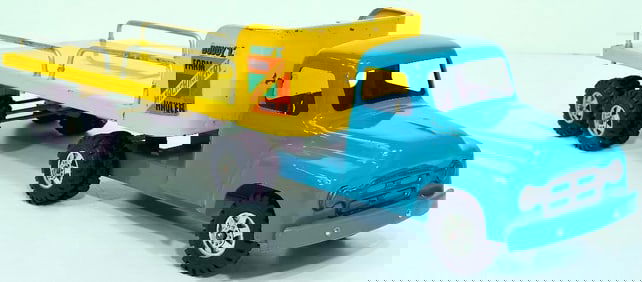 Buddy L Postwar 5586 Farm Machinery Hauler Tractor and Trailer blue and yellow manufactured 1956 -