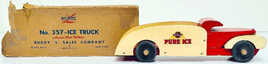 Buddy L Prewar 357 Wood Pure Ice Truck red and white and manufactured 1943 to 1944 with original box: Buddy L Prewar 357 Wood Pure Ice Truck red and white and manufactured in 1943 to 1944, in C7 plus to C7 minus. This piece includes an original box that shows heavy wear.