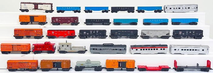 Lionel Postwar O Gauge Twenty - Six Assorted Freight Cars and Four (4) Passenger Cars Shell only