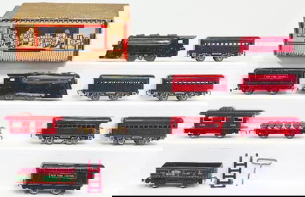 Marx Prewar O Gauge 0 - 4 - 0 Black Locomotive with NYC Tender and Three (3) Assorted Freight Cars