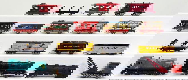 Marx Postwar O Gauge Prewar and Postwar O Gauge Nine (9) Assorted Freight Cars with Shell only Loco