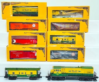 Lionel Modern O Gauge Reading Lines U36A Switcher and U36B Switcher and Eight Assorted Freight Cars