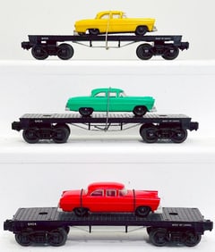 Lionel Postwar O Gauge 6404 Flat Car with Lionel Autos X3