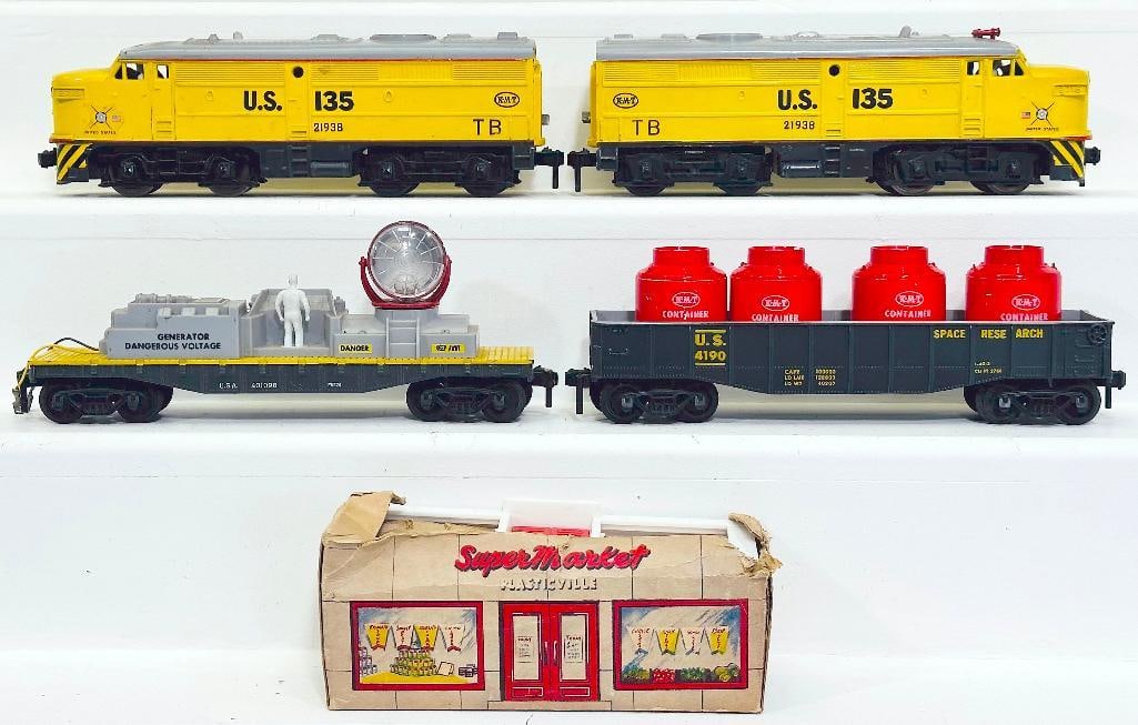 Kusan Postwar O Gauge United States Army A - A Alco Diesel Units - 4190 Research Gondola: Kusan Postwar O Gauge United States Army A - A Alco Diesel Units - 4190 Research Gondola with Canisters - 40198 Generator Car, each in C7 minus or better. This Lot also includes a Super Market, in C7