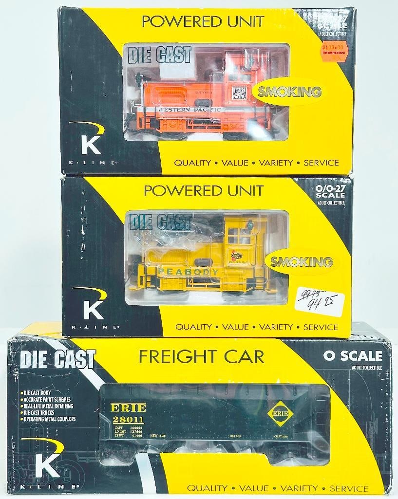 Lionel Modern O Gauge Western Pacific Plymouth Switcher?Peabody Plymouth Switcher?Erie Diecast: Lionel Modern O Gauge Western Pacific Plymouth Switcher - Peabody Plymouth Switcher - Erie Diecast Smooth Sided 2 Bay Hopper Boxed, each in C8 plus and each with its original box.