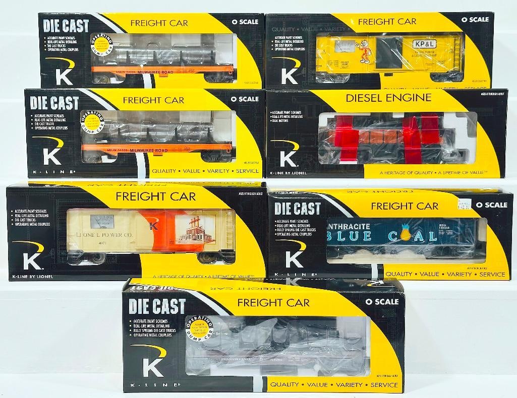 K-Line Modern O Gauge Seven (7) Assorted Freight Cars and Switcher Boxed: K-Line Modern O Gauge Seven (7) Assorted Freight Cars and Switcher Boxed, including RDG Diecast Hopper with blue coal load, Milwaukee Road S - 2 Diesel Switcher with Horn, K-Line Power and Light Opera
