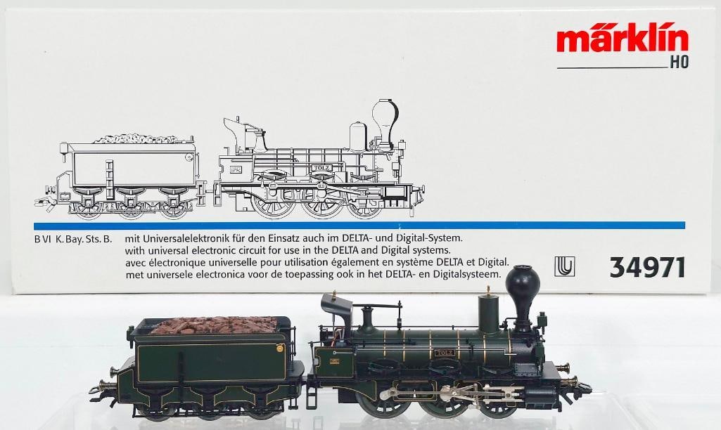 Marklin Modern HO Scale #34971 B VI K. BAY. STS. B Locomotive and Tender Boxed: Marklin Modern HO Scale #34971 B VI K. BAY. STS. B Locomotive and Tender Boxed, in C8 or better and with its original box, and with Delta Digital. The longest item in this Lot is 12 inches.