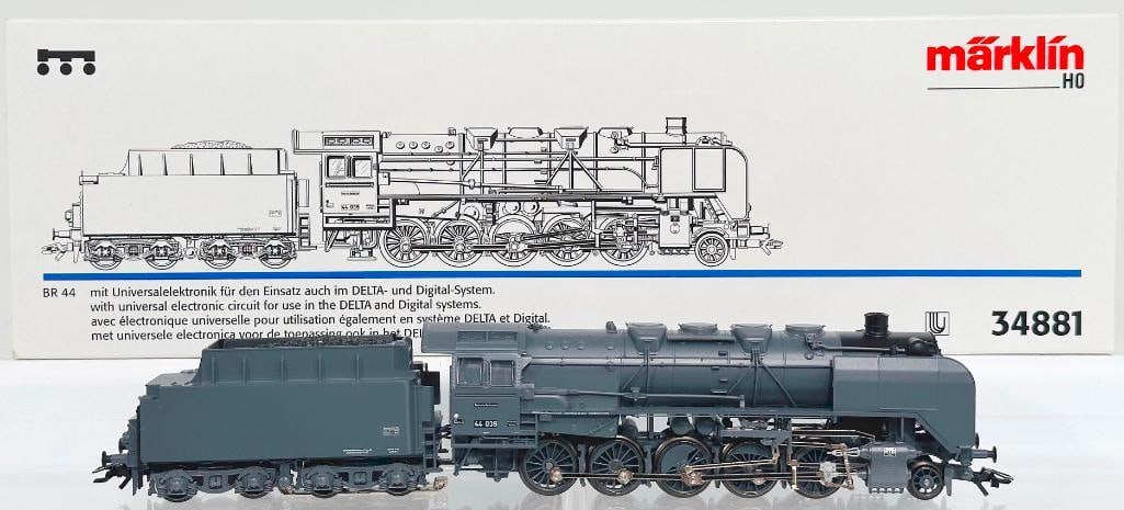 Marklin Modern HO Scale #34881 2 - 10 - 2 BR 44 Locomotive and Tender Boxed: Marklin Modern HO Scale #34881 2 - 10 - 2 BR 44 Locomotive and Tender Boxed, in C8 or better and with its original box, and with limited edition gray finish.